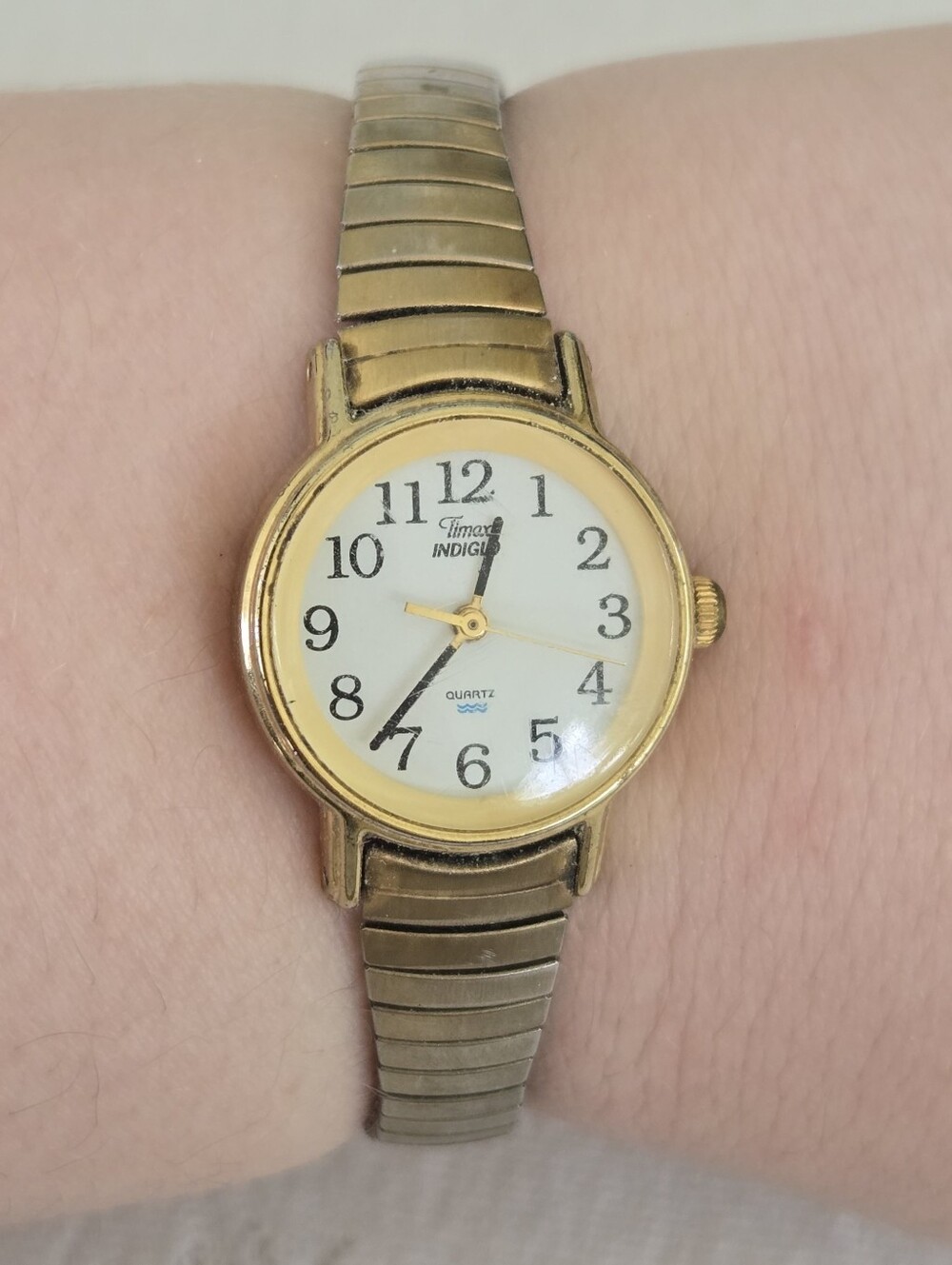 Timex Gold-Tone Women's Indiglo Analog Watch with White Dial Elastic StretchBand